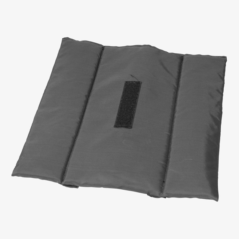 An extra-padded seat sling removed from a wheelchair.