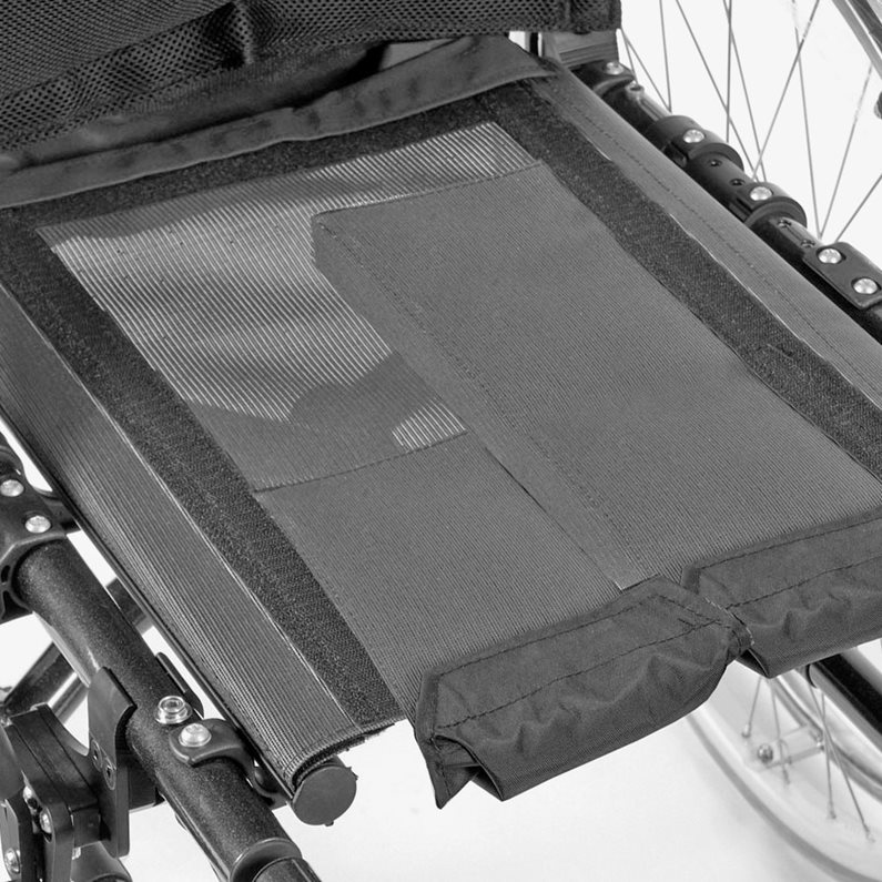 A seat sling with utility bag mounted onto a wheelchair.